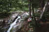 mike relaxing by the falls.jpg (99040 bytes)